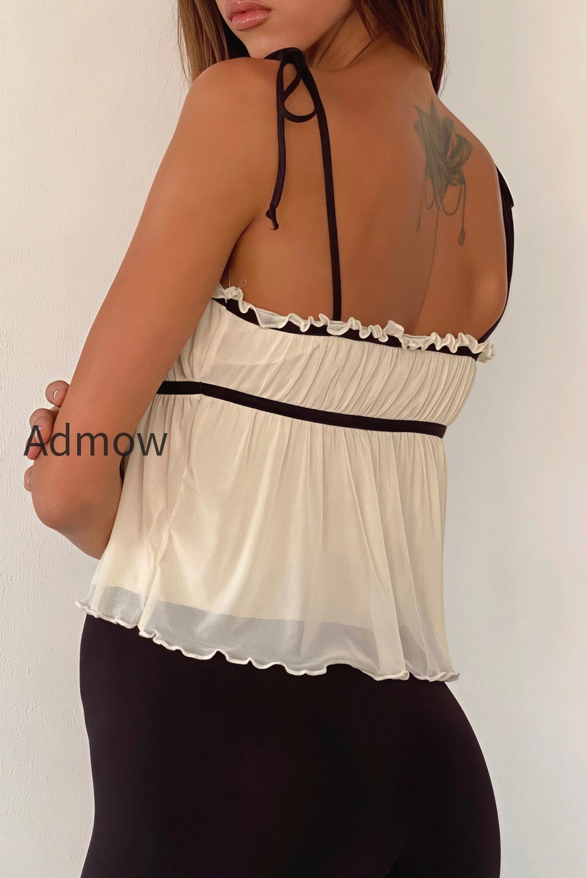 solid-ruffle-hem-tie-bow-cami-top